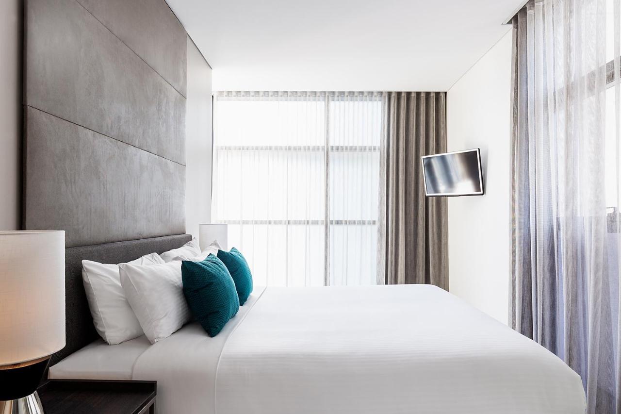 الشقق الفندقية أجنحة فريزر سيدني المظهر الخارجي الصورة A bedroom at the hotel